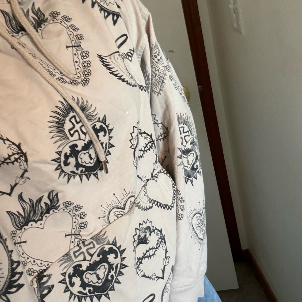 Hoodie with heart and cross design